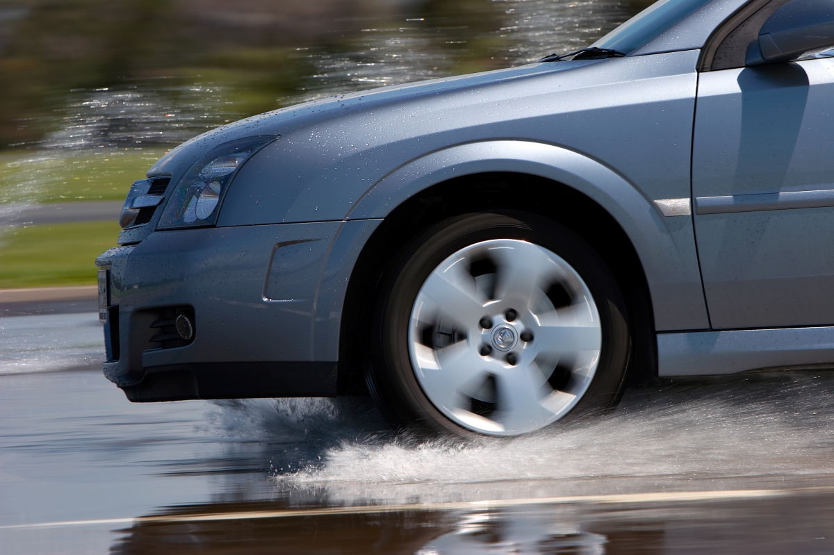 Car Braking on Rainy Road