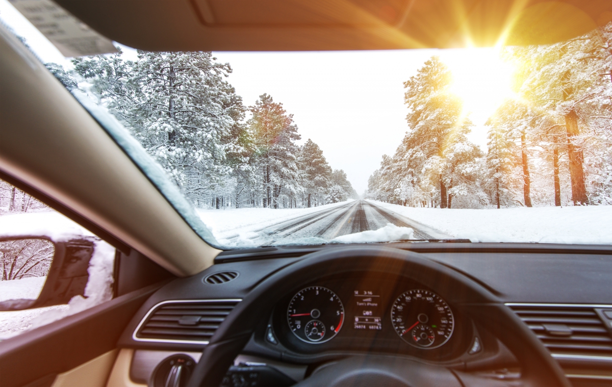 Car Interior on Winter Road